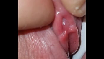 I found her small and shaven pussy and stimulated it until she reached an orgasm.