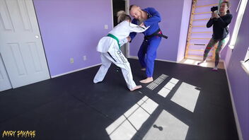 Petite blonde gets rough and tumble in this homemade video with her jiu jitsu instructor.