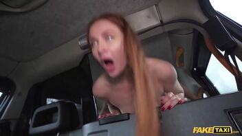 Red hair beauty seduces with her long hair and sexy stockings while having sex in a taxi.