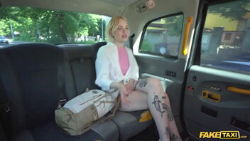 A blonde gets a rough and hard sex in a taxi cab.