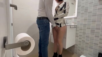 A girl seduces a waiter in a restaurant and gives him a blowjob in the bathroom.