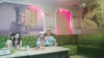 Four women engage in kinky activity at a Chinese KTV club.