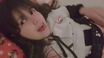 This is an amateur teen video of Hana Lily, a brunette with a big ass, fucking a pillow.